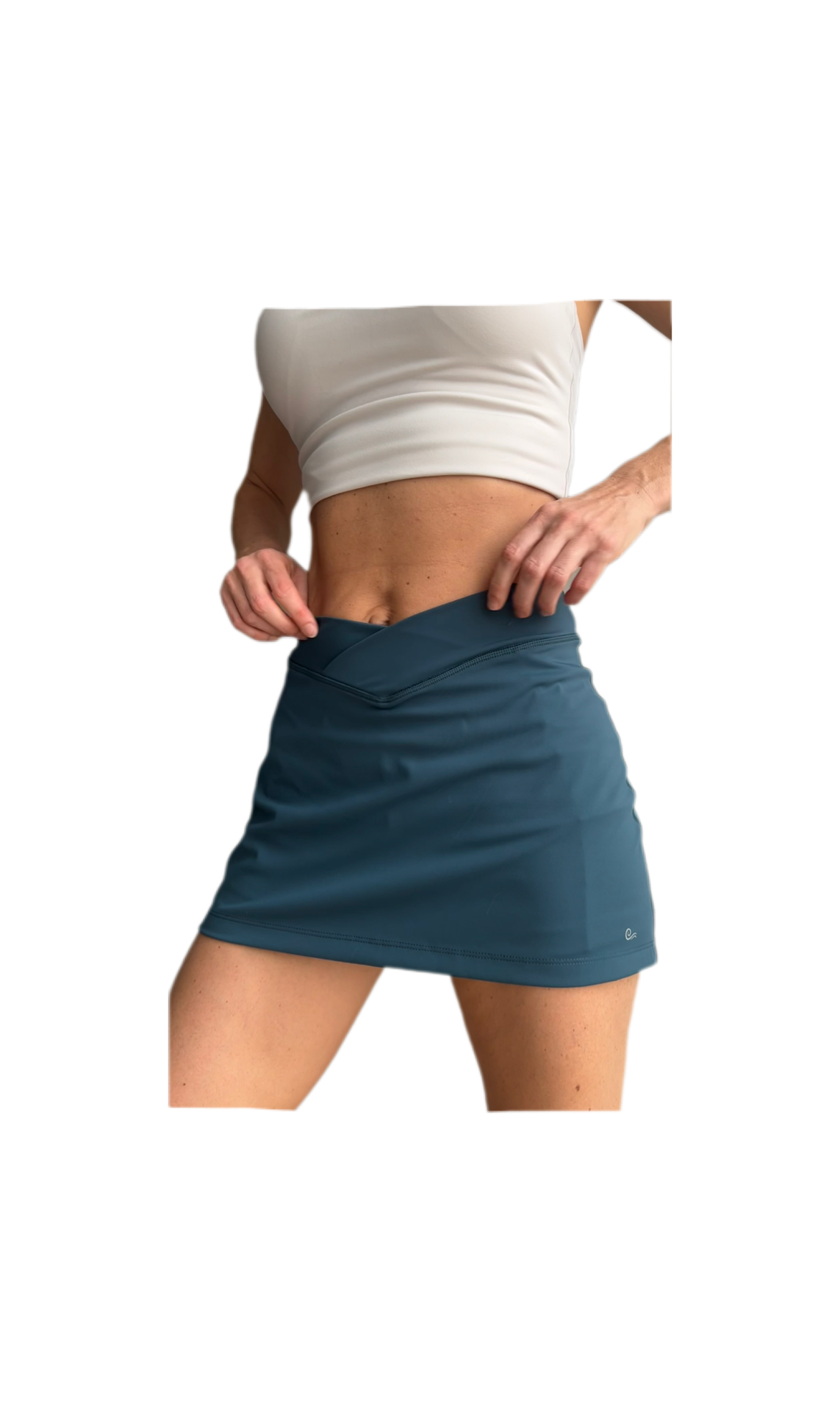 Falda short deportiva verde petróleo con bolsillos